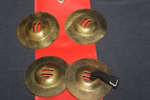 lot 257 image: Two Pair Brass Finger Cymbals