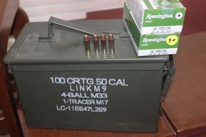 lot 373 image: Vintage 50 cal ammo can with 2 boxes of 38 special 50 roundsper box  130 grain and 4 rounds of 38 special hollow point