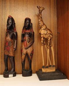 lot 4 image: Two African figures made in Kenya and a wooden giraffe see all pictures