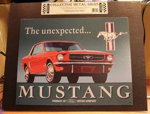 lot 15 image: Collector metal sign the unexpected mustang