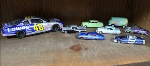 lot 31 image: Action 2003 Jimmie Johnson #48 Lowes  124 Scale Die-cast car and hand full of small cars see pictures