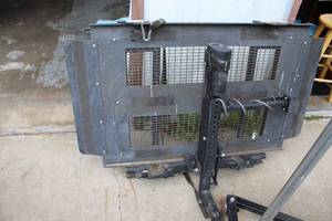 lot 46 image: Electronic wheelchair ramp left is missing the key so key will need to be replaced and is extremely heavy bring you own help to remove please