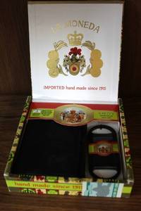 lot 47 image: La moneda imported hand made since 1915  wallet and bottle opener