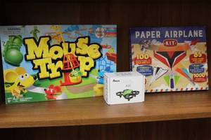 lot 56 image: Mouse trap game paper airplane kitflying toy