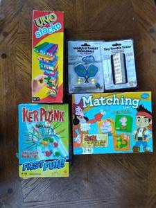 lot 73 image: Game lot Uno stacko kerplunk matching game and 2 mini games mini games are unopened