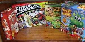 lot 76 image: Mixed lot of games like Yahtzee banana blast wiggle wiggle foosketball