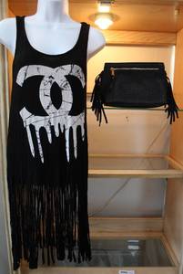 lot 82 image: Handbag and large shirt (hanging mannequin not included)