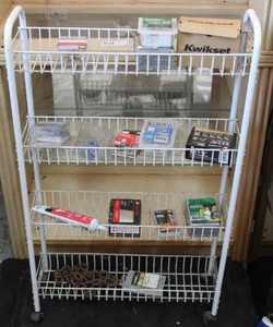 lot 89 image: Rolling shelf with a mix of things screws bolts and many more see pictures