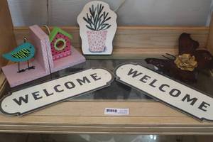 lot 92 image: Welcome metal signs and book ends and more see pictures