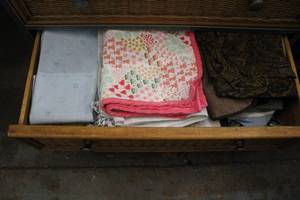 lot 107 image: baby blankets and pads and more get all in drawer (dresser not included)