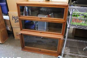 lot 126 image: Shelf with three glass doors that lift and slide in