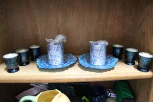 lot 181 image: candle holders with candles and 2 candle holder blue plates with 2 candles that set on them