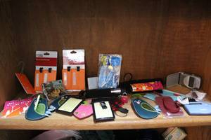 lot 205 image: mixed lot of luggage tags and more see all pics