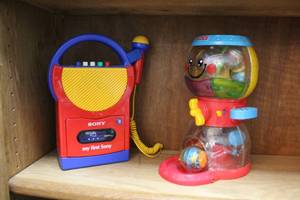 lot 209 image: Fisher Price Roll-a-Rounds Swirlin Surprise Gumball Machine Peek Blocks and my first Sony