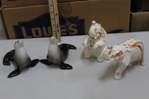 lot 282 image: Porcelain seals and porcelain elephants