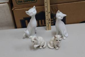 lot 302 image: Porcelain cats