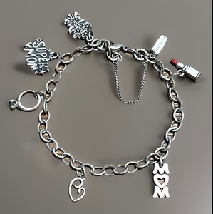 lot 20 image: Sterling Silver James Avery Charm Bracelet WSeven (7) Charms