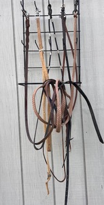 lot 69 image: Seven (7) Piece Lot Of Straps to Saddle Horses - Including Leather &amp Braided