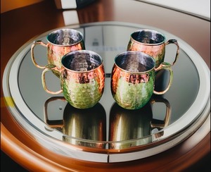 lot 85 image: Vintage Hammered Copper Mugs