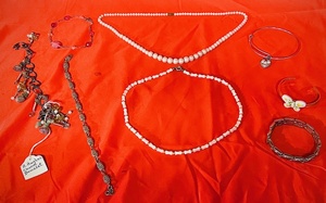 lot 113 image: Lot of Eight (8) Bracelets &amp Necklaces - Including an H. Hughes Charm Bracelet