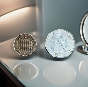 lot 183 image: 1956 United Kindom 3 Pence &amp 2004 United Kingdom 50 Pence,50th Anniversary of 1st Sub-4 Minute Mile