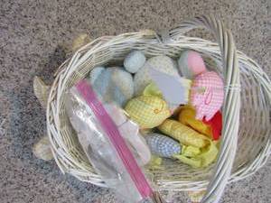 lot 38 image: white wicker basket with misc. stuff in it