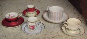 lot 86 image: small coffee cups and small cup plates