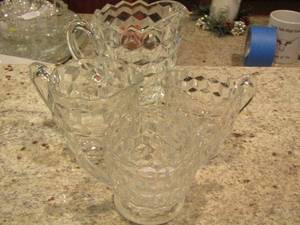 lot 46 image: handled glass pitcher and 3 handled coffee cups