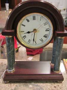 lot 53 image: Clock - glass is broken , praying hands glass sculpture