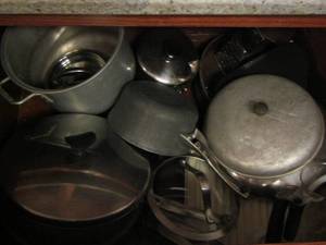 lot 208 image: Various pots and pans with some lids
