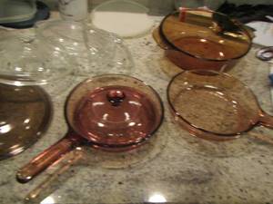 lot 224 image: glass pot handled with various lids