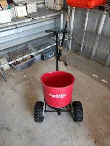 lot 69 image: EarthWay round spreader