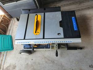 lot 54 image: Ryobi 10 portable table saw
