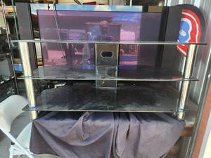 lot 105 image: Glass top TV stand