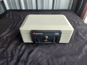 lot 79 image: Sentry safe with keys