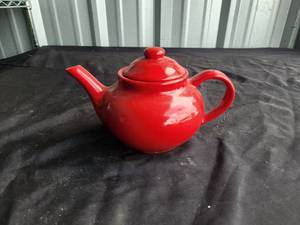 lot 52 image: Red ceramic teapot