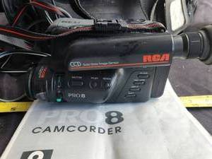 lot 94 image: Vintage RCA Pro-8 Camcorder with case and some accessories