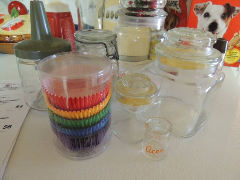 lot 59 image: Candy jars, assorted muffin tins li...