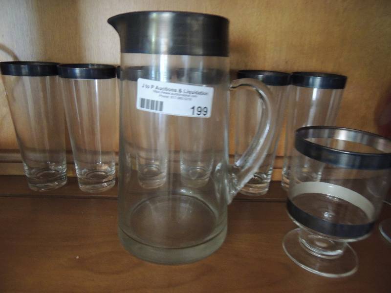 lot 199 image: Pitcher and Glass set with metal rim...
