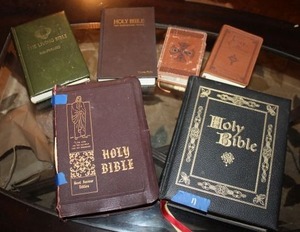 lot 11 image: Vintage family Bibles and personal Bibles