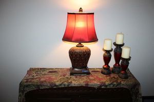 lot 38 image: Table lamp and candle holder set with beaded table covercurtain