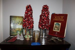 lot 2 image: Christmas book and dcor, Study Bible, and mini Christmas trees - clear light up trees and S&P shaker