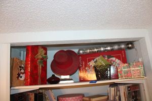 lot 67 image: Christmas dcor Fitz and Floyd snack therapy plate, silver ornaments, Angel figurine, red glass vase, red hat and more
