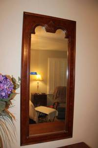 lot 93 image: Solid wood wall mirror - 22x49