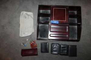 lot 121 image: Mens wallets, storage organizing box and dart sets
