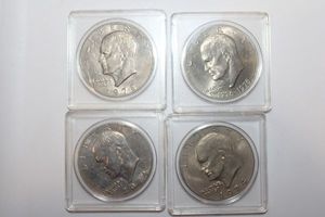 lot 138 image: US currency--Ike One Dollar coins - 4 x the money
