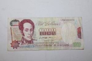 lot 144 image: Foreign currency-- Venezuelan 1000 Bolivares is no longer in circulation.