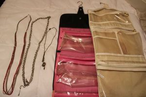 lot 175 image: Hanging toiletries organizers for travel plus Jewelry necklaces as shown