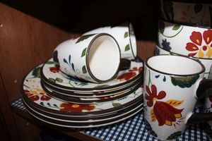 lot 208 image: Floral dish set (one mug needs handle repair)