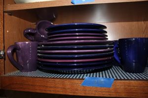 lot 210 image: Blue and purple dish set by Salute